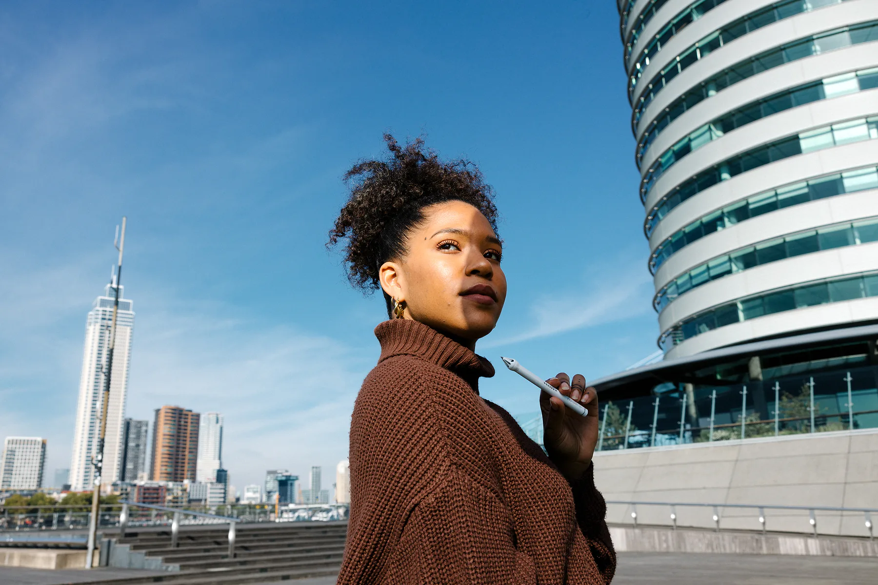 Holding a Nuwa Pen outdoors